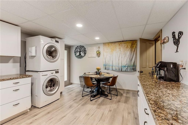 99 Bree Ln, Canton, GA 30114 - laundry area with laundry area, stacked washer and clothes dryer, light wood-style floors, baseboards, and recessed lighting