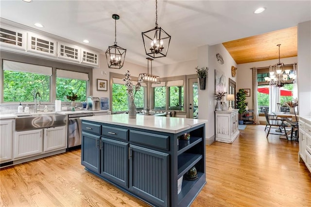99 Bree Ln, Canton, GA 30114 - kitchen featuring a sink, dishwasher, a chandelier, and light countertops