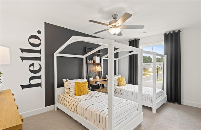 carpeted bedroom with ceiling fan