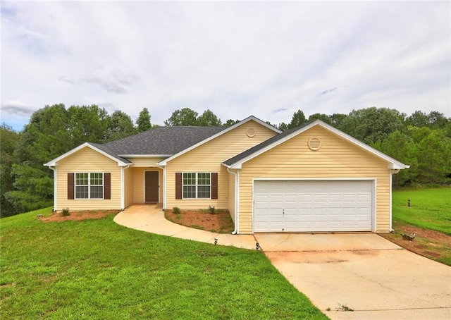 ranch-style house featuring a front lawn and a garage