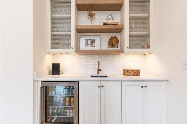 3338 Breton Cir NE, Brookhaven, GA 30319 - indoor wet bar with wine cooler and tasteful backsplash
