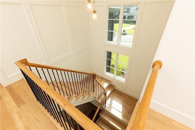 3338 Breton Cir NE, Brookhaven, GA 30319 - stairway with a decorative wall and wood finished floors