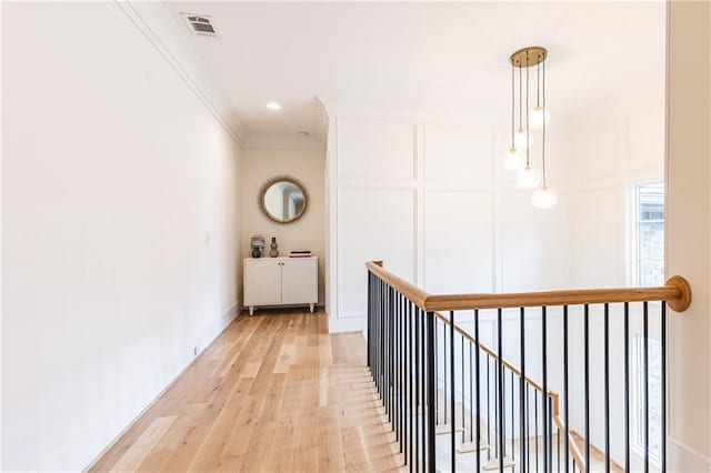 3338 Breton Cir NE, Brookhaven, GA 30319 - hallway featuring ornamental molding, light wood finished floors, an upstairs landing, and recessed lighting