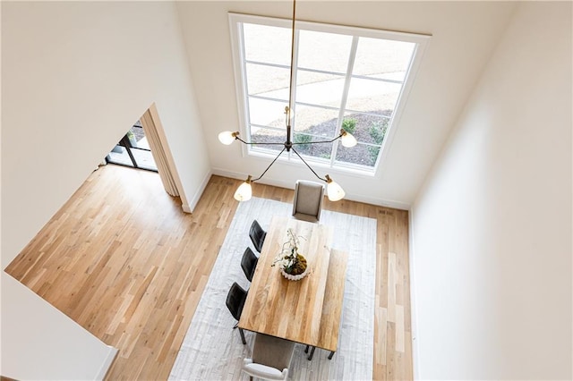 3338 Breton Cir NE, Brookhaven, GA 30319 - living room featuring healthy amount of natural light, light wood-style flooring, and baseboards