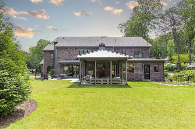3338 Breton Cir NE, Brookhaven, GA 30319 - back of house featuring a patio, a gazebo, and brick siding