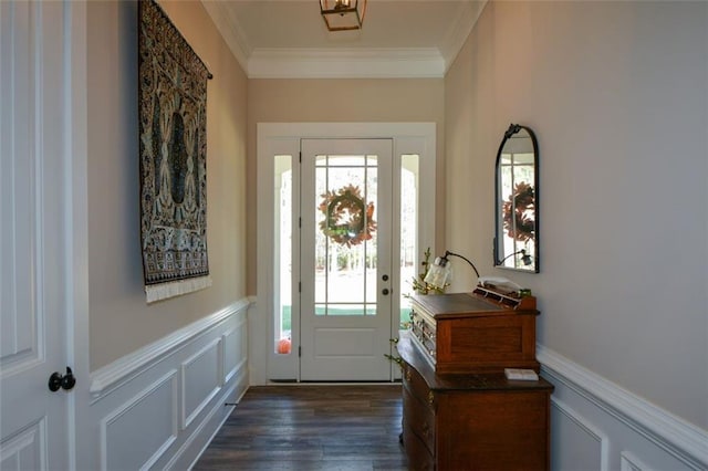 doorway featuring dark hardwood / wood-style flooring, a healthy amount of sunlight, and ornamental molding