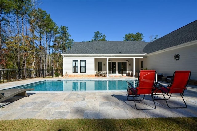 view of pool with a patio area and ceiling fan