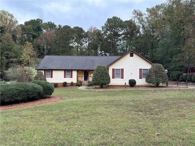 ranch-style house with a front lawn