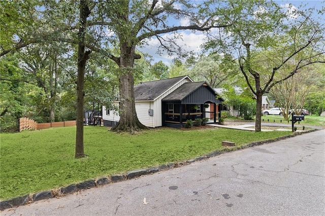 view of front of house with a front lawn