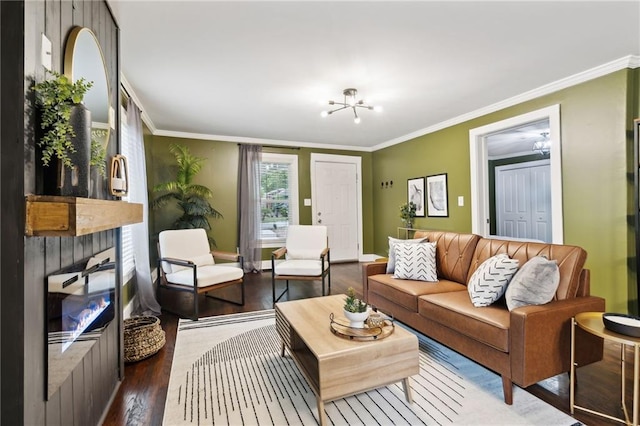 living room featuring dark hardwood / wood-style floors and crown molding