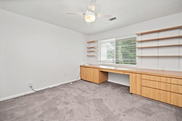 full bathroom with vanity, tile patterned floors, tiled shower / bath combo, and toilet