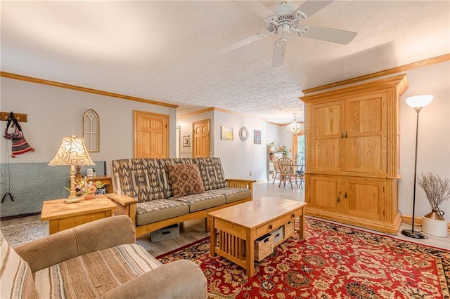 5848 Kingswood Ct, Norcross, GA 30093 - living area featuring crown molding, ceiling fan, a chandelier, and wood finished floors