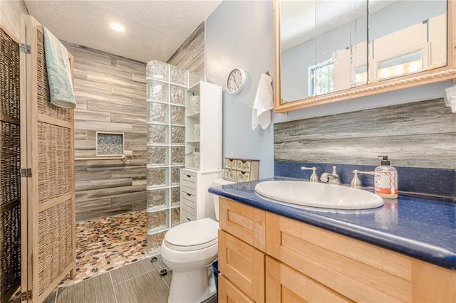 5848 Kingswood Ct, Norcross, GA 30093 - bathroom with a walk in shower, vanity, recessed lighting, and a textured ceiling