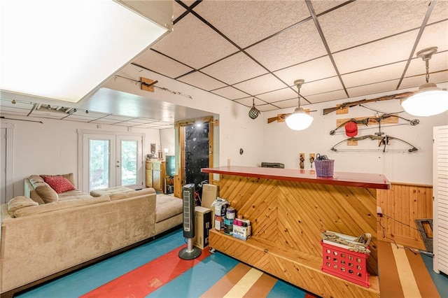 5848 Kingswood Ct, Norcross, GA 30093 - rec room with a wainscoted wall, a paneled ceiling, wooden walls, and a dry bar