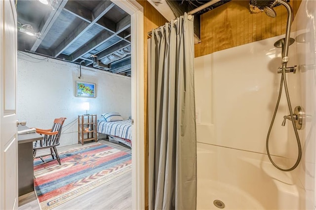 5848 Kingswood Ct, Norcross, GA 30093 - full bathroom with a shower with shower curtain and wood finished floors