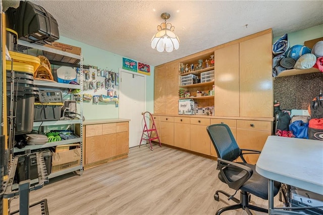 5848 Kingswood Ct, Norcross, GA 30093 - office with light wood-style flooring and a textured ceiling