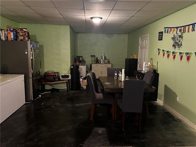 dining room featuring a paneled ceiling