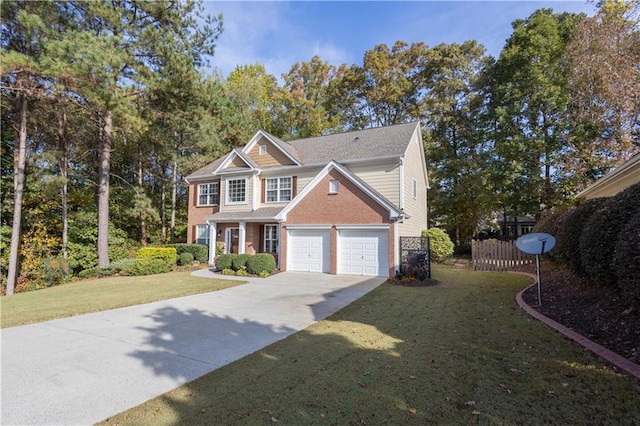 view of front of house featuring a front lawn and a garage