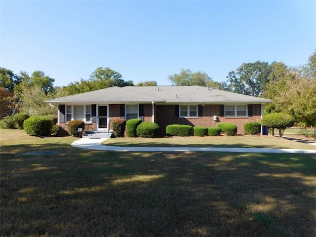 893 Andrews Dr, Conyers, GA 30012 - ranch-style home featuring a front yard and brick siding