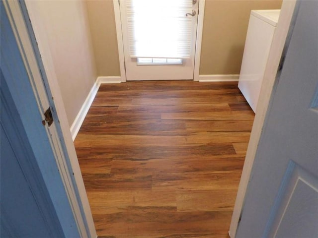 893 Andrews Dr, Conyers, GA 30012 - doorway featuring wood finished floors and baseboards