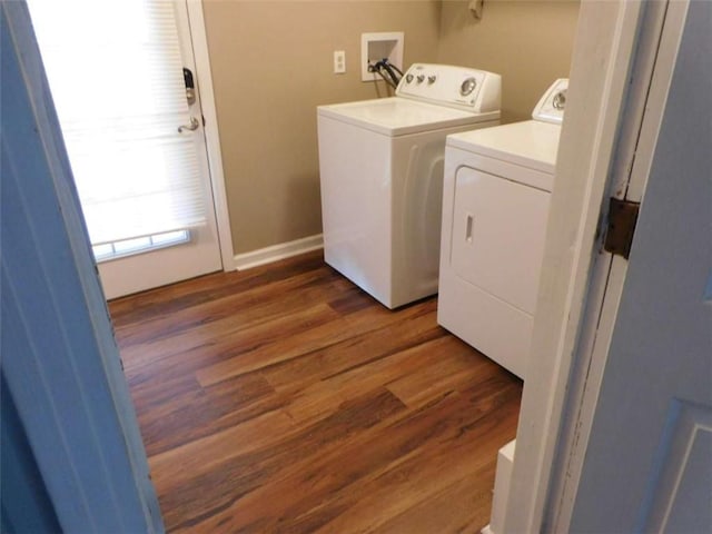 893 Andrews Dr, Conyers, GA 30012 - washroom featuring washer and dryer, wood finished floors, and baseboards