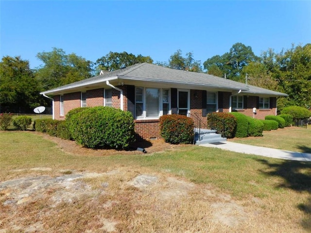 893 Andrews Dr, Conyers, GA 30012 - view of front of home with brick siding and a front lawn