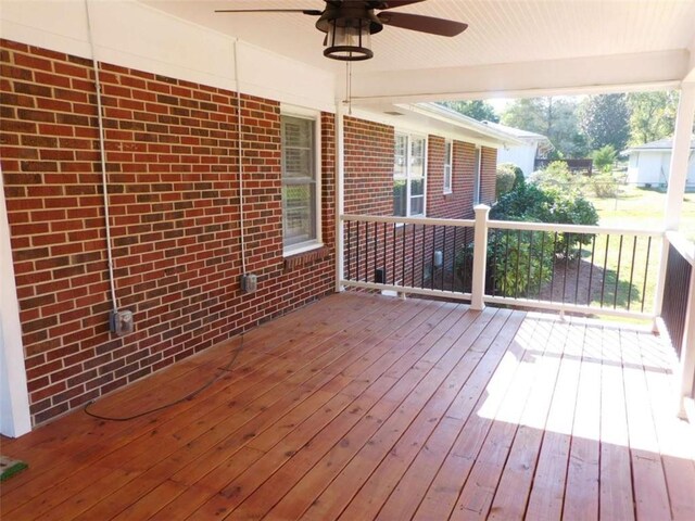 893 Andrews Dr, Conyers, GA 30012 - wooden terrace with a ceiling fan