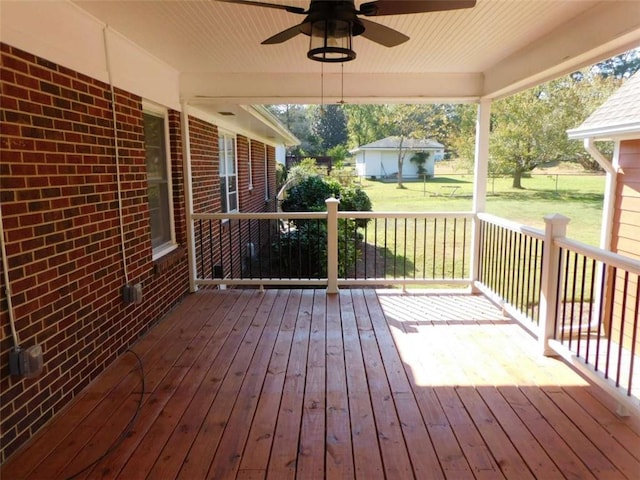 893 Andrews Dr, Conyers, GA 30012 - wooden deck with a ceiling fan and a yard