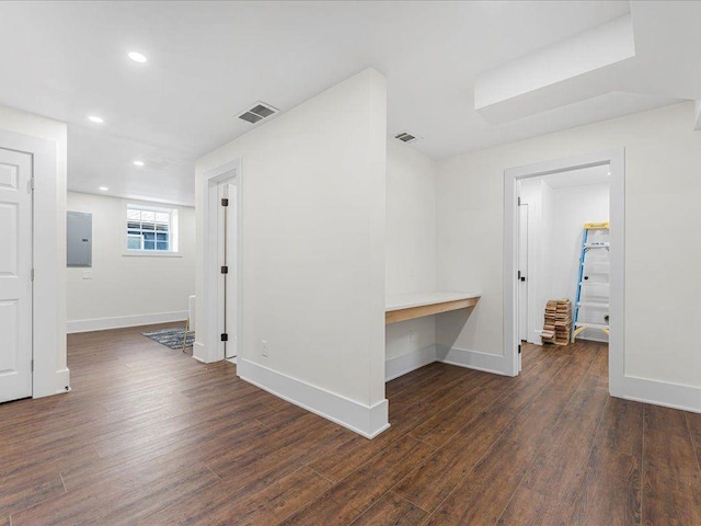 1603 Ezra Church Dr NW, Atlanta, GA 30314 - empty room with electric panel, wood finished floors, baseboards, and recessed lighting