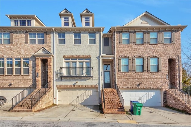 multi unit property featuring a garage