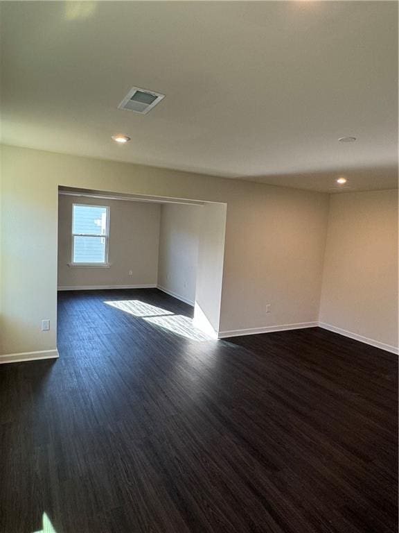 136 Paulownia Cir, Mcdonough, GA 30253 - unfurnished room with dark wood-type flooring and recessed lighting