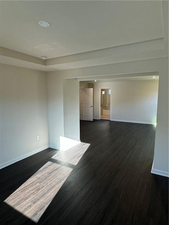 136 Paulownia Cir, Mcdonough, GA 30253 - unfurnished room featuring baseboards and dark wood finished floors