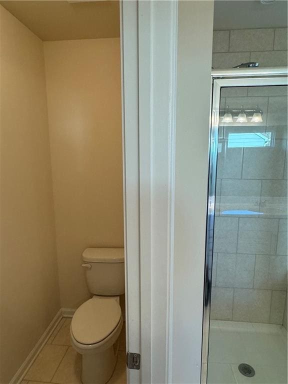 136 Paulownia Cir, Mcdonough, GA 30253 - bathroom with tile patterned floors and a shower stall
