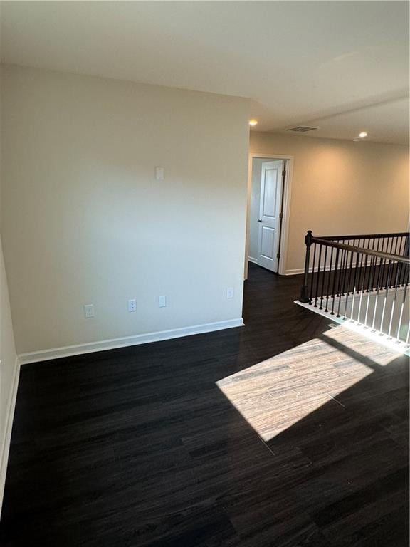 136 Paulownia Cir, Mcdonough, GA 30253 - empty room featuring dark wood-style flooring and recessed lighting