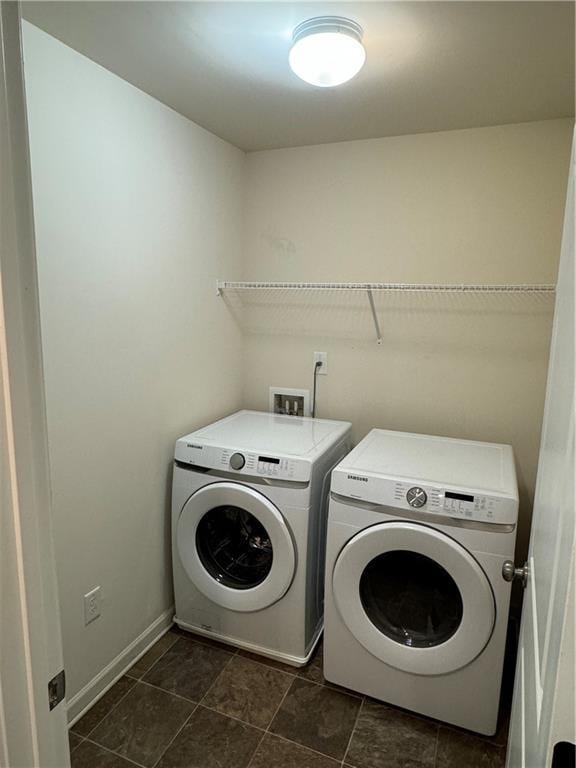 136 Paulownia Cir, Mcdonough, GA 30253 - laundry room featuring separate washer and dryer and baseboards