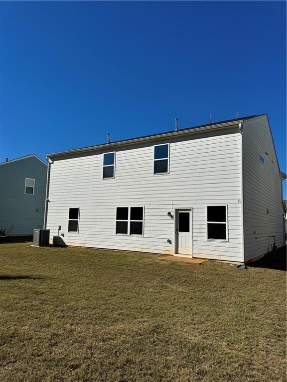136 Paulownia Cir, Mcdonough, GA 30253 - rear view of house featuring a yard