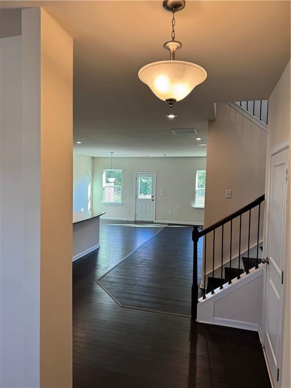 136 Paulownia Cir, Mcdonough, GA 30253 - hall with dark wood finished floors and stairs