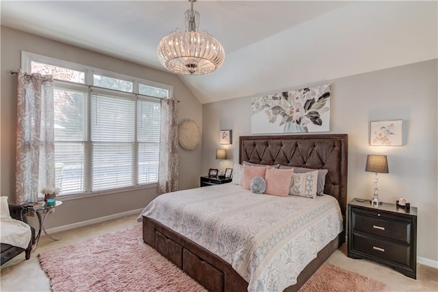 bedroom featuring light carpet, multiple windows, and lofted ceiling