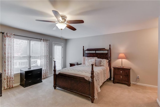 bedroom featuring ceiling fan and light colored carpet