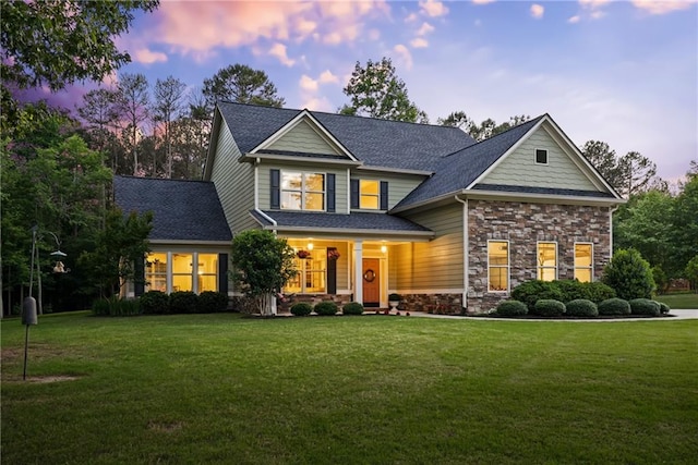 372 Abbington Way, Clarkesville, GA 30523 - view of front of property with a lawn, stone siding, covered porch, and a shingled roof