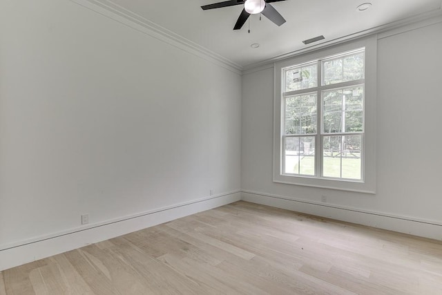 4459 Grady Smith Rd, Loganville, GA 30052 - spare room featuring ceiling fan, light wood-style flooring, and ornamental molding