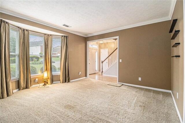 4272 Glenlake Dr NW, Kennesaw, GA 30144 - unfurnished room with carpet flooring, a textured ceiling, ornamental molding, stairs, and baseboards