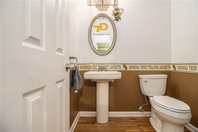 4272 Glenlake Dr NW, Kennesaw, GA 30144 - bathroom with toilet, wood finished floors, a sink, and baseboards