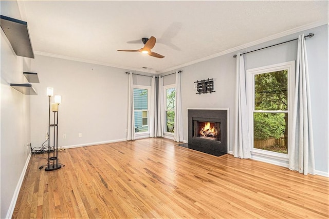 4272 Glenlake Dr NW, Kennesaw, GA 30144 - unfurnished living room featuring light wood finished floors, a ceiling fan, a fireplace with flush hearth, ornamental molding, and baseboards
