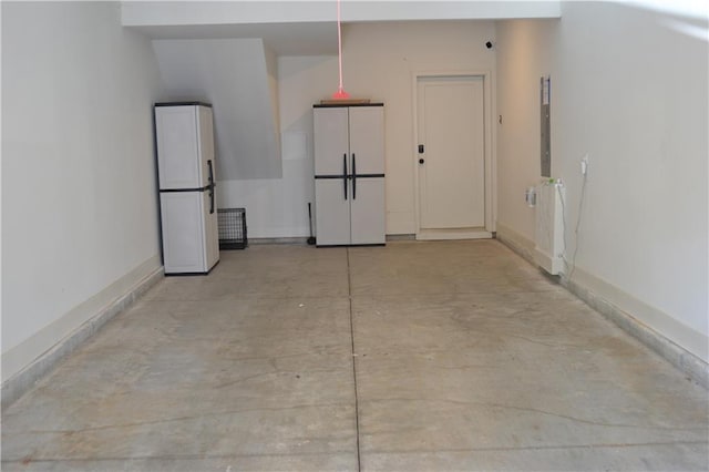 1350 May Ave Unit 14, Atlanta, GA 30316 - garage with freestanding refrigerator and baseboards