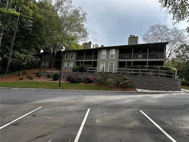1101 Lenox Way NE Unit 1101, Atlanta, GA 30324 - view of property featuring uncovered parking