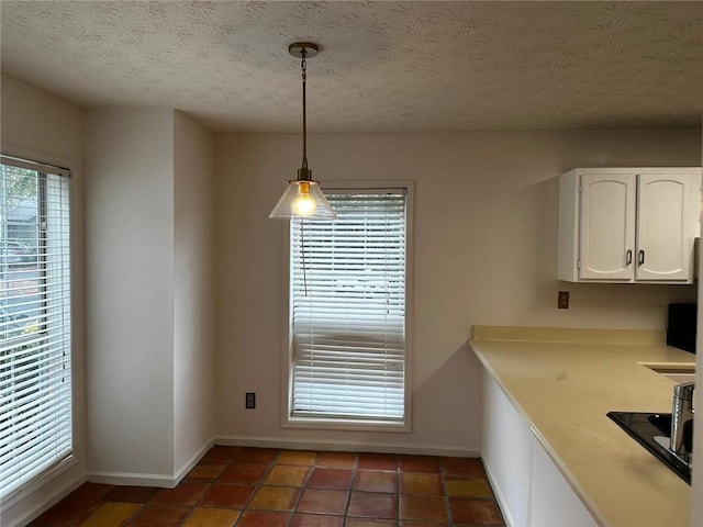 1101 Lenox Way NE Unit 1101, Atlanta, GA 30324 - unfurnished dining area with baseboards, a textured ceiling, and tile patterned flooring