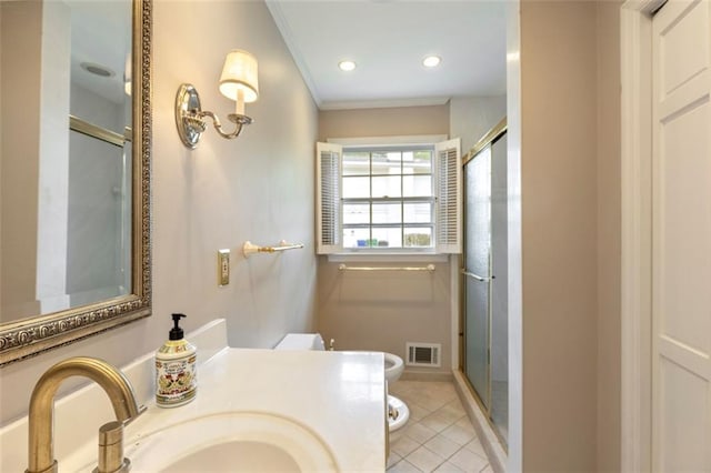 full bathroom featuring toilet, crown molding, a shower stall, tile patterned floors, and vanity