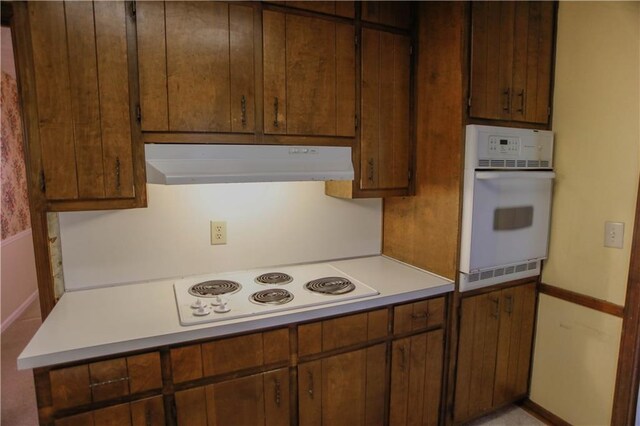 kitchen featuring white appliances