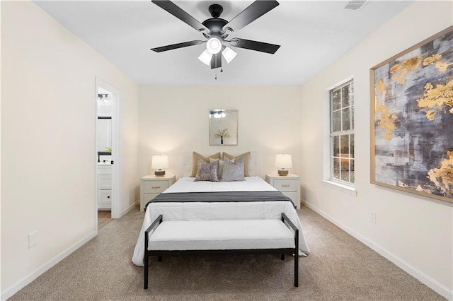 bedroom featuring light colored carpet, a ceiling fan, and baseboards